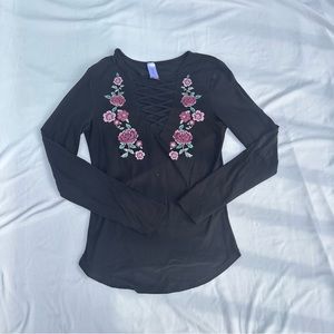 Women’s black floral crisscross top